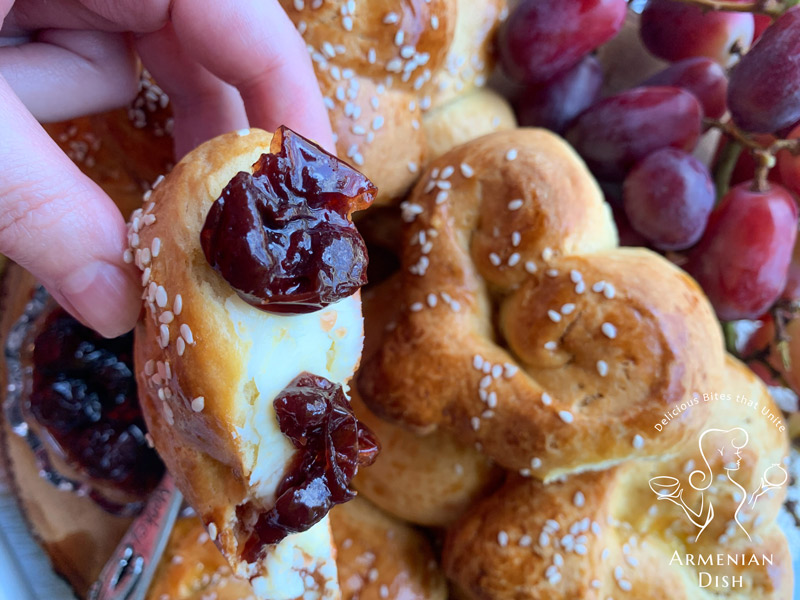 Heart-shaped Armenian Choreg Easter Bread close-up with Ijevan cherry jam and butter